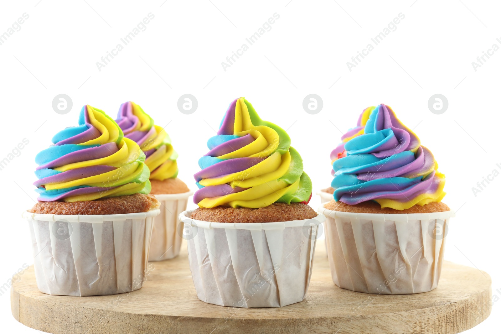 Photo of Tasty cupcakes with colorful cream on white background, closeup