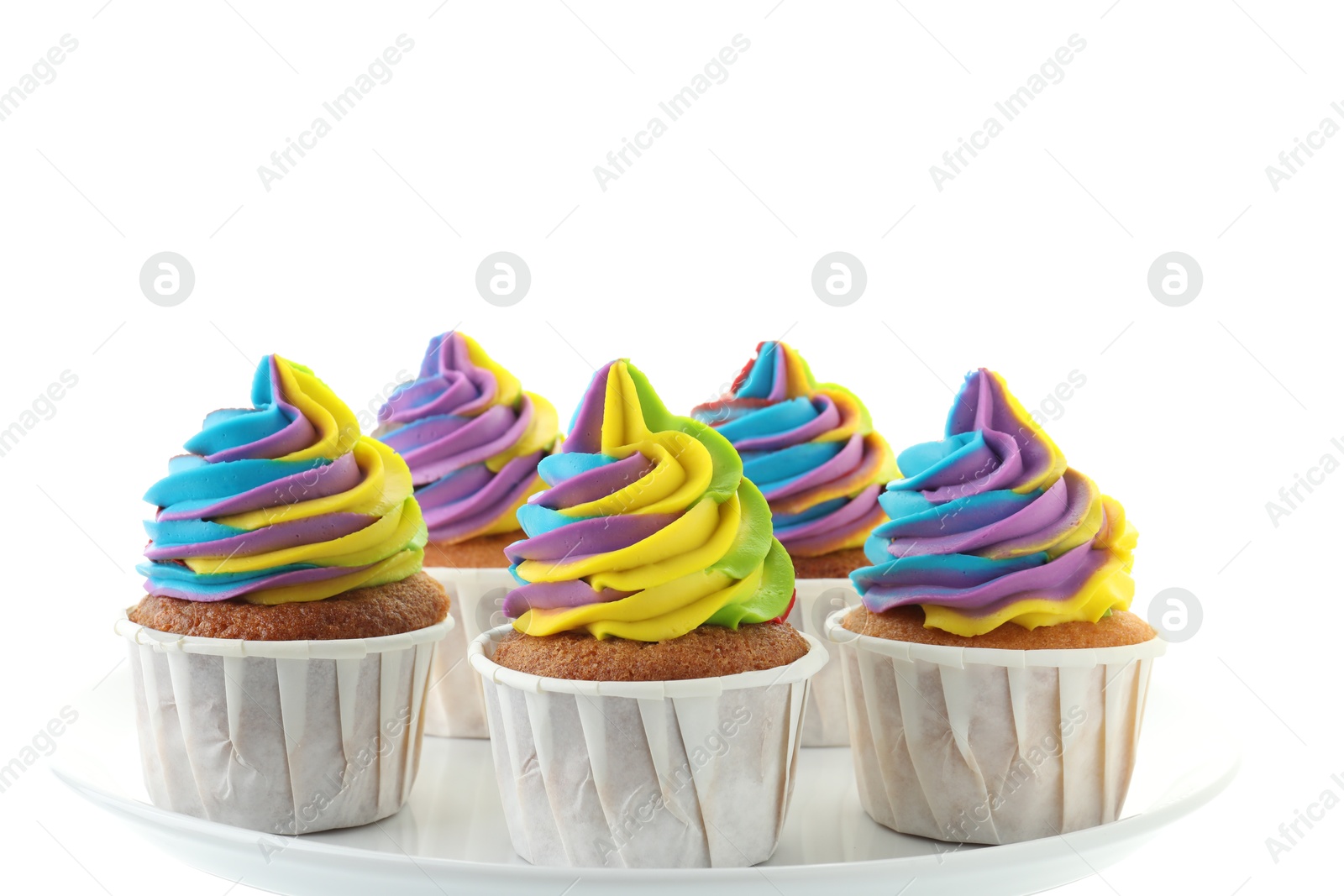 Photo of Tasty cupcakes with colorful cream on white background