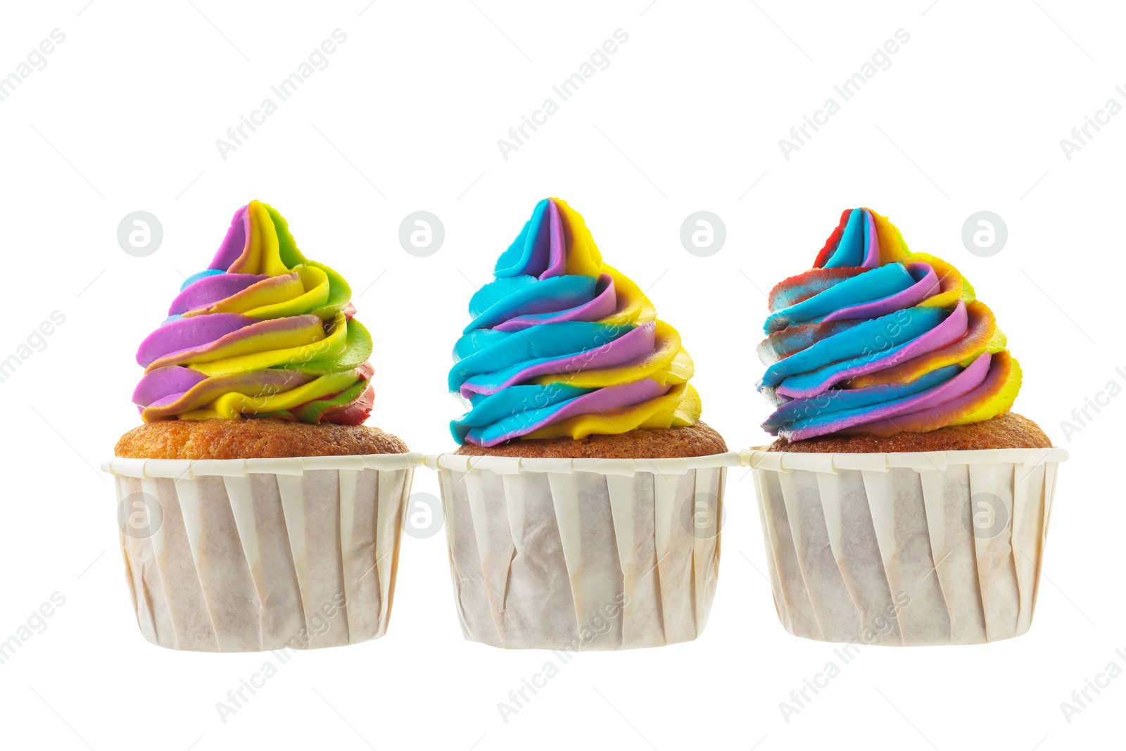 Photo of Tasty cupcakes with colorful cream isolated on white