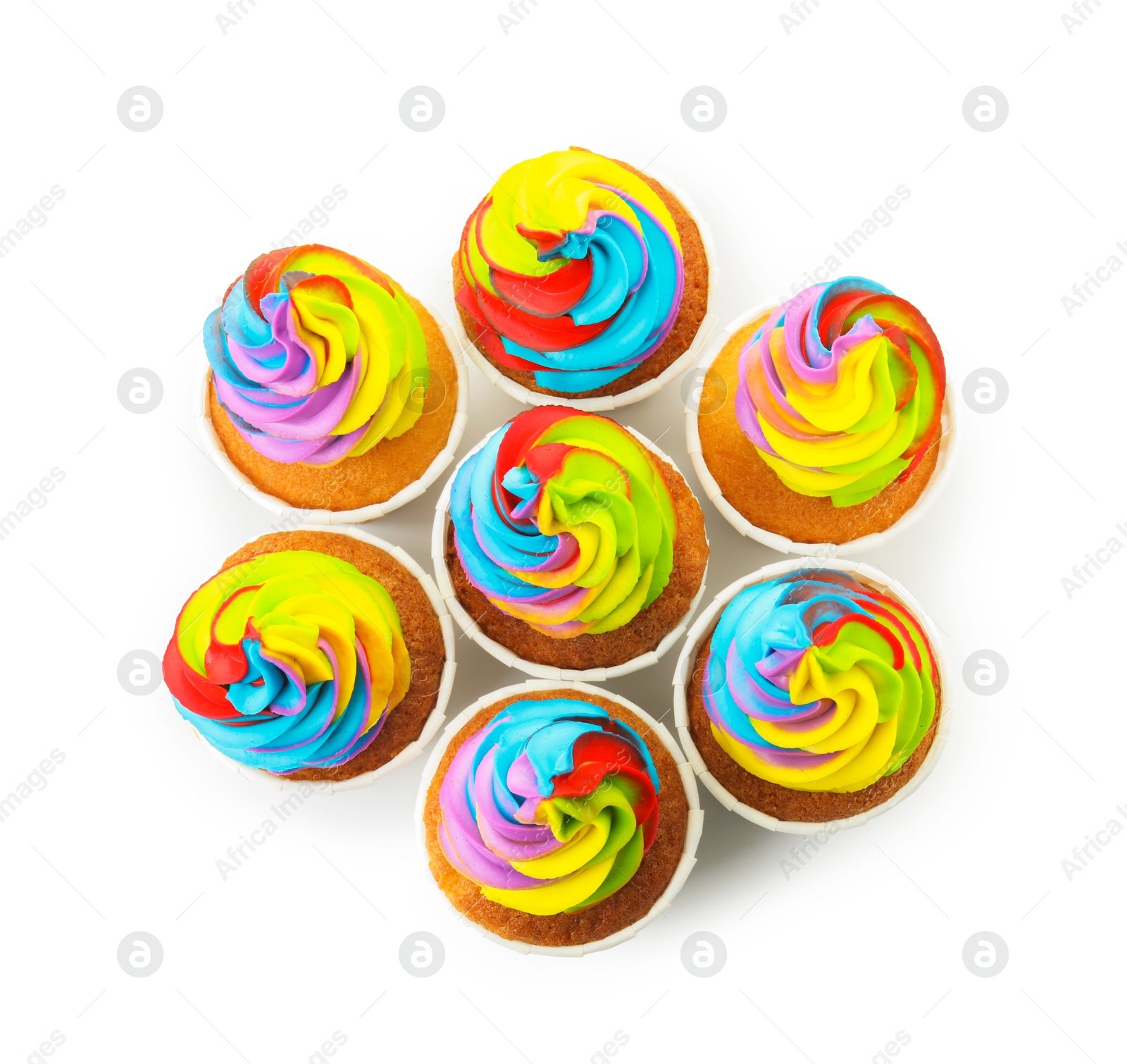 Photo of Tasty cupcakes with colorful cream isolated on white, top view