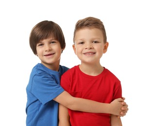 Photo of Portrait of cute brothers on white background