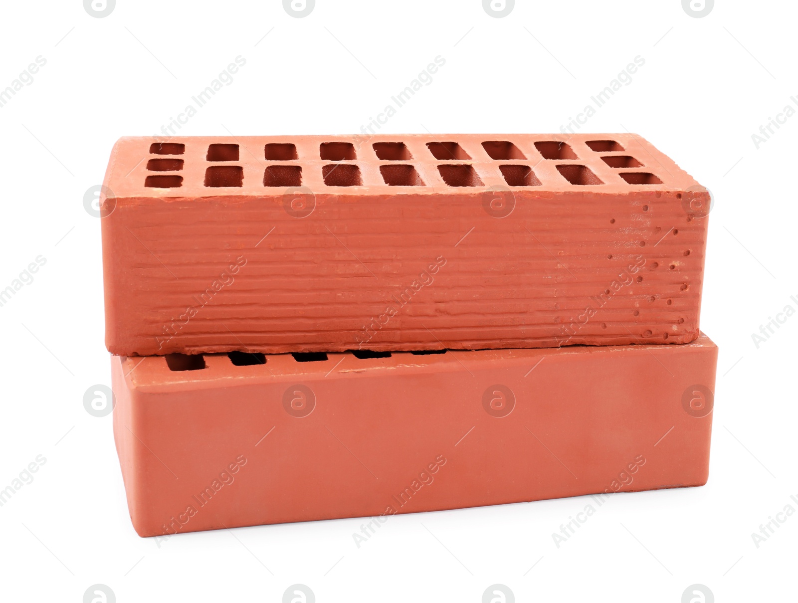 Photo of Red bricks isolated on white. Construction material