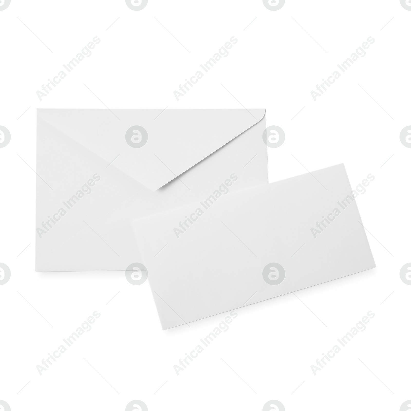 Photo of Envelopes isolated on white, top view. Mockup for design