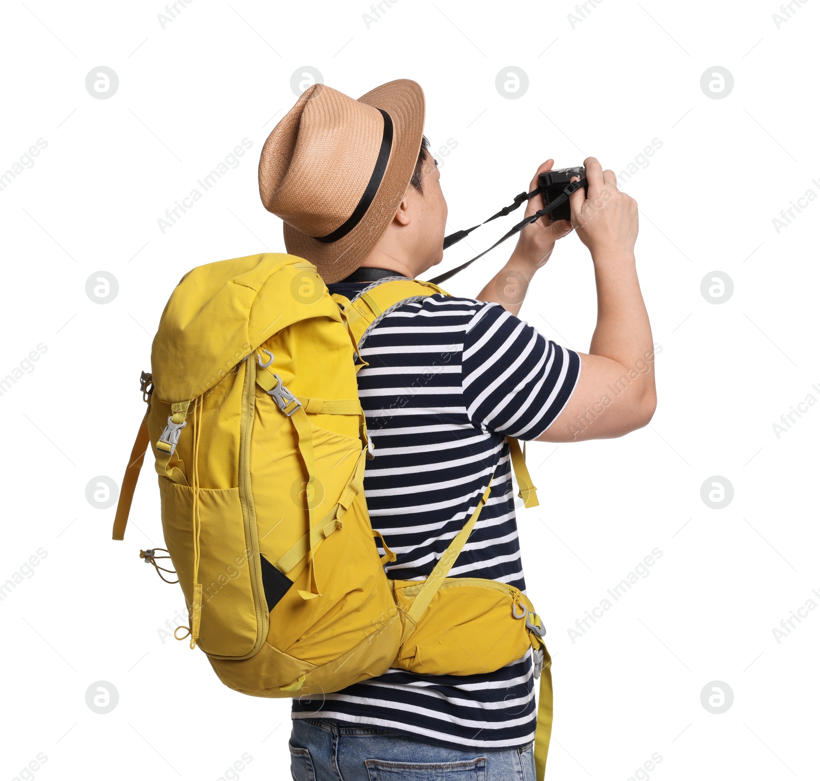 Photo of Traveller with backpack taking photo on white background, back view