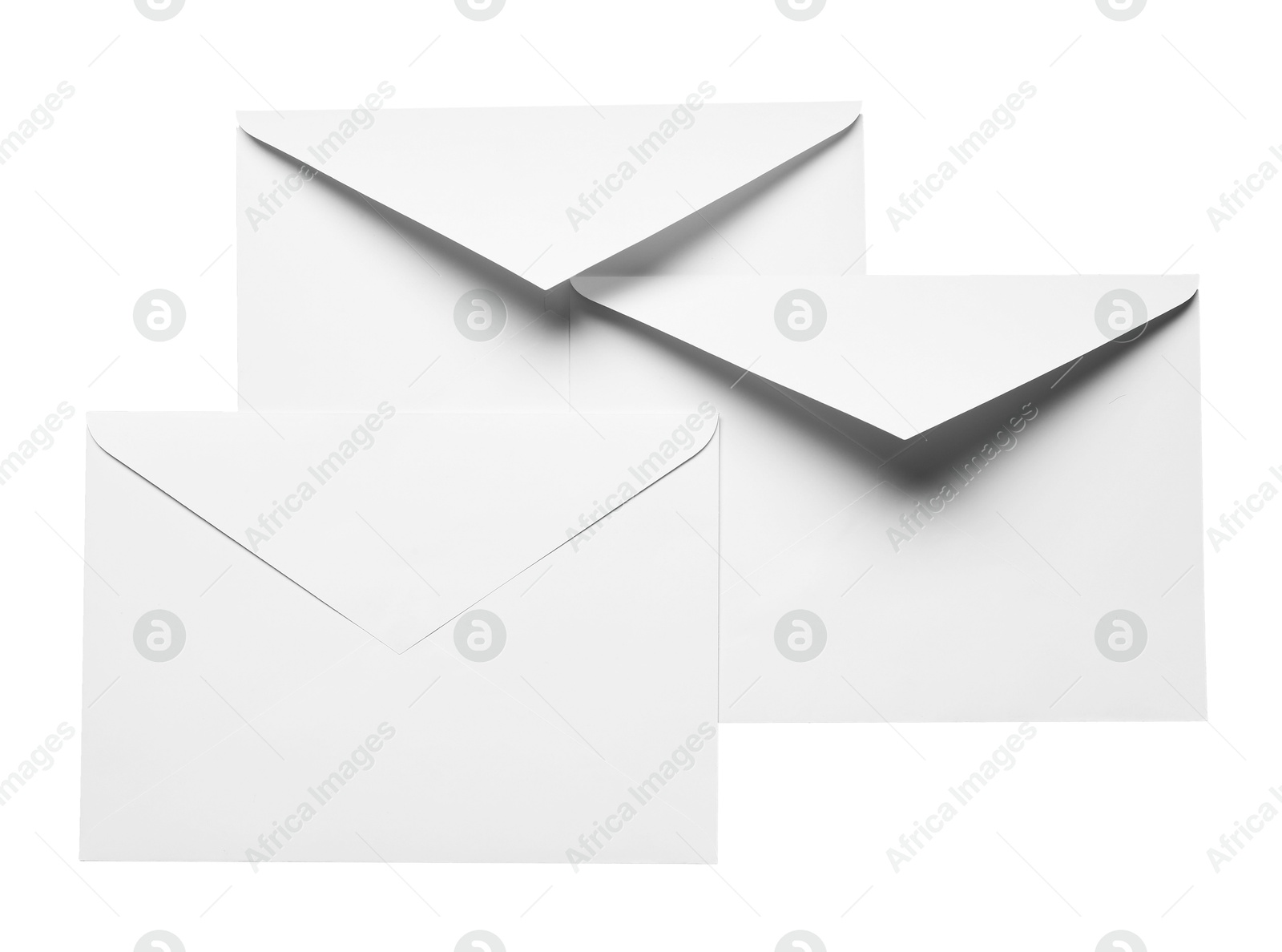 Photo of Envelopes isolated on white, top view. Mockup for design