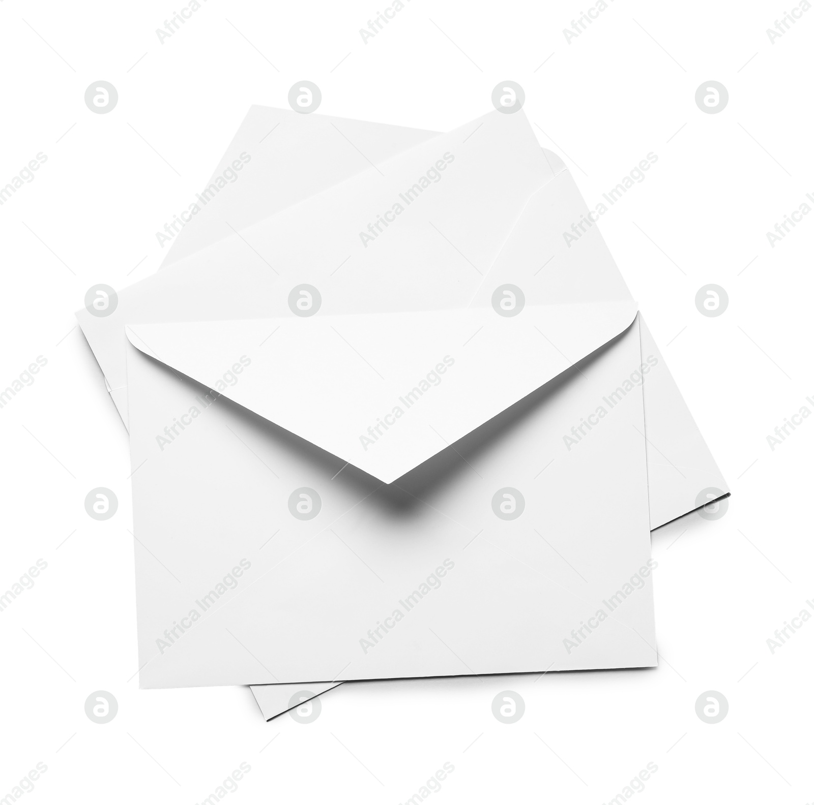 Photo of Envelopes with card isolated on white, top view. Mockup for design