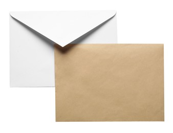 Photo of Envelopes isolated on white, top view. Mockup for design