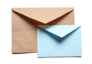 Photo of Envelopes isolated on white, top view. Mockup for design