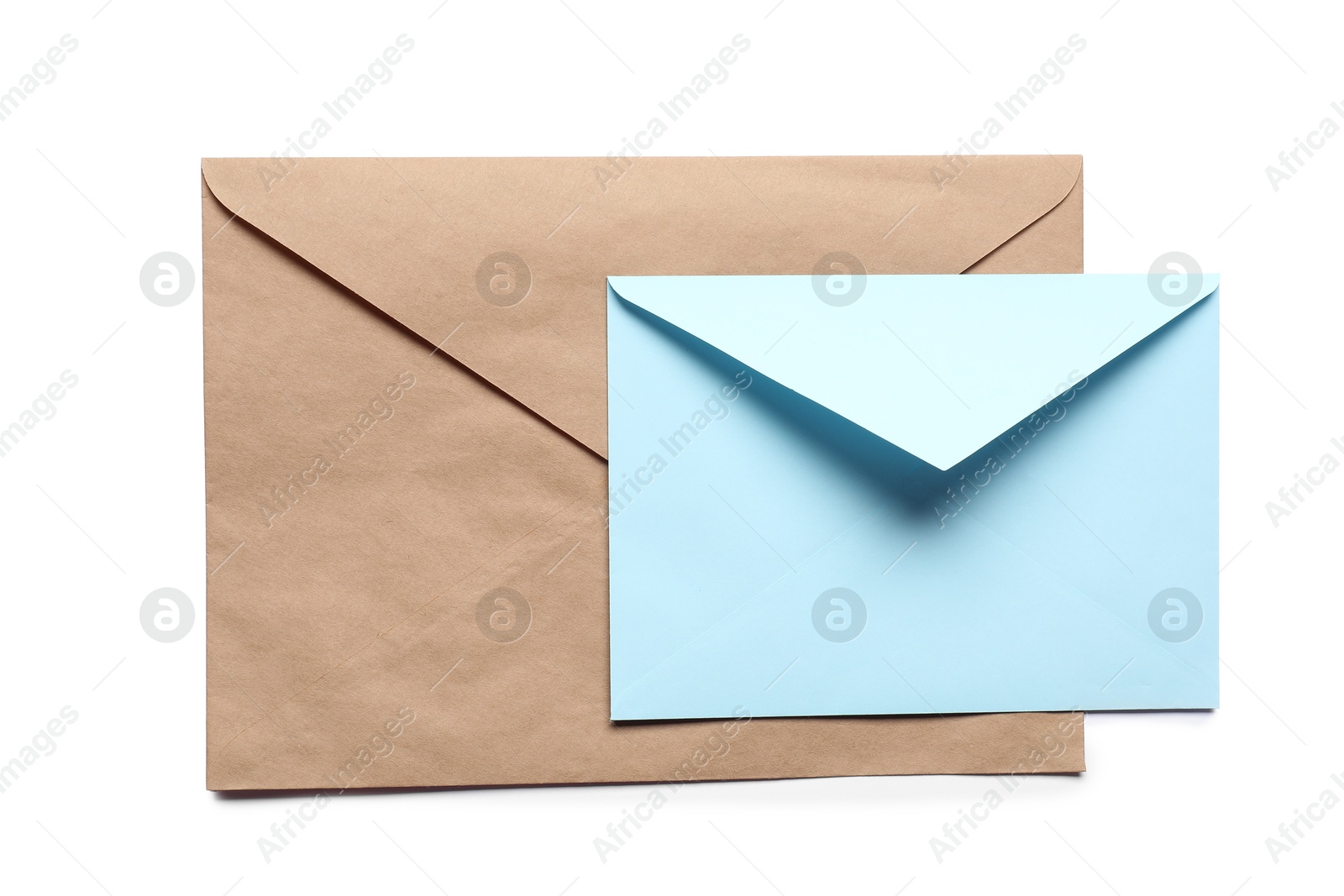 Photo of Envelopes isolated on white, top view. Mockup for design