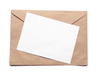 Photo of Envelope with card isolated on white, top view. Mockup for design