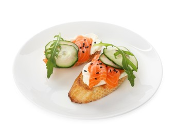 Photo of Delicious bruschette with cream cheese, salmon and cucumber isolated on white