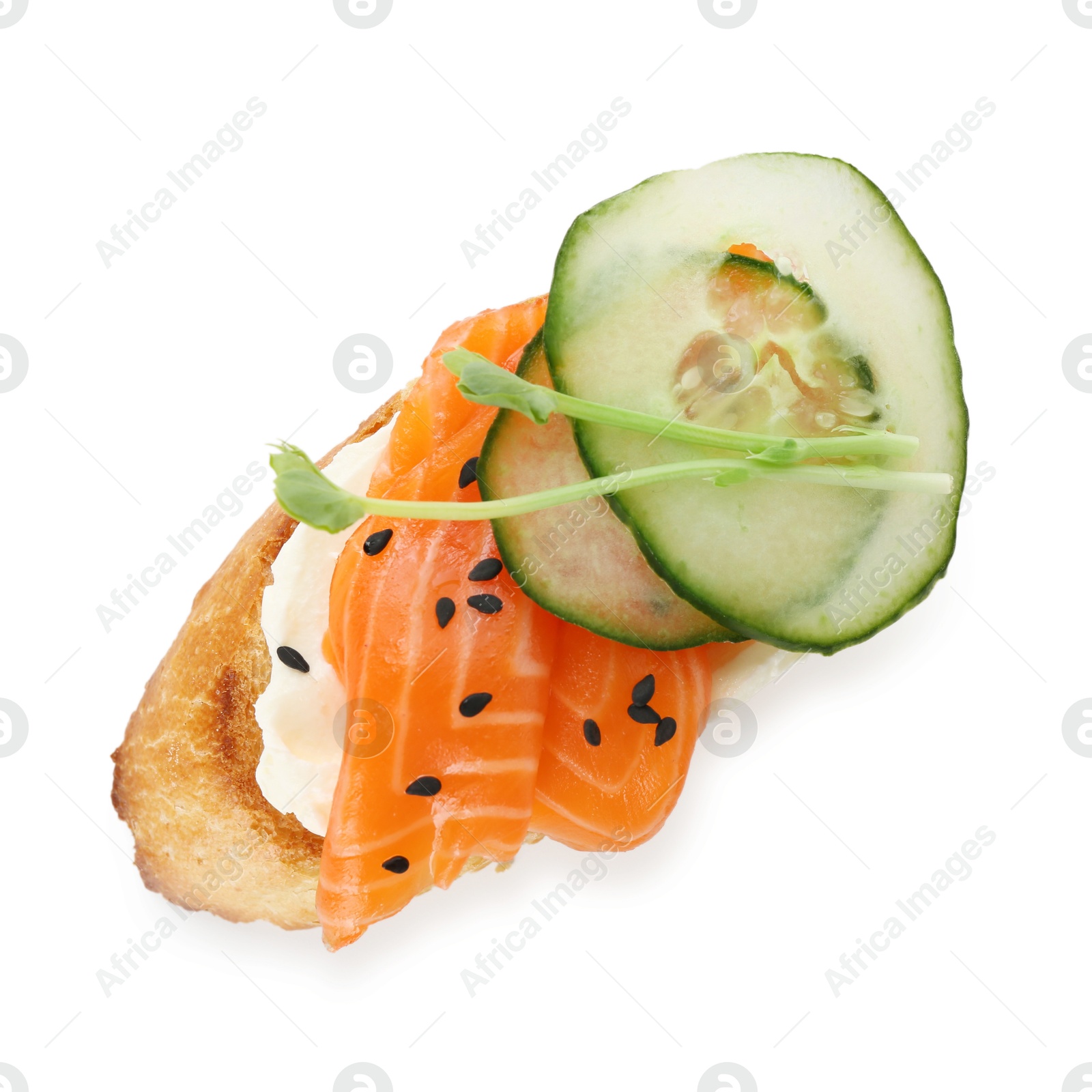 Photo of Delicious bruschetta with cream cheese, salmon and cucumber isolated on white, top view