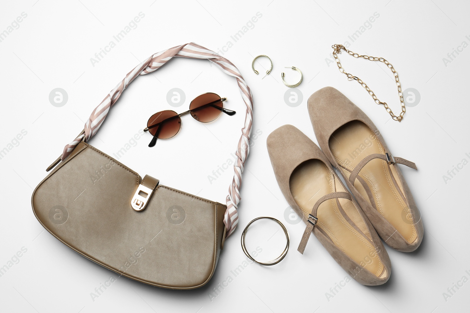 Photo of Beautiful bag, shoes and stylish accessories on white background, flat lay