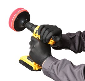 Photo of Man holding electric screwdriver with polish pad on white background, closeup