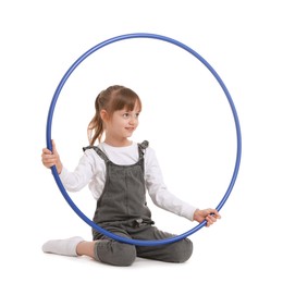 Photo of Cute little girl with hula hoop on white background