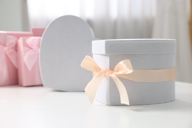 Photo of Gift box for wedding day on white table indoors