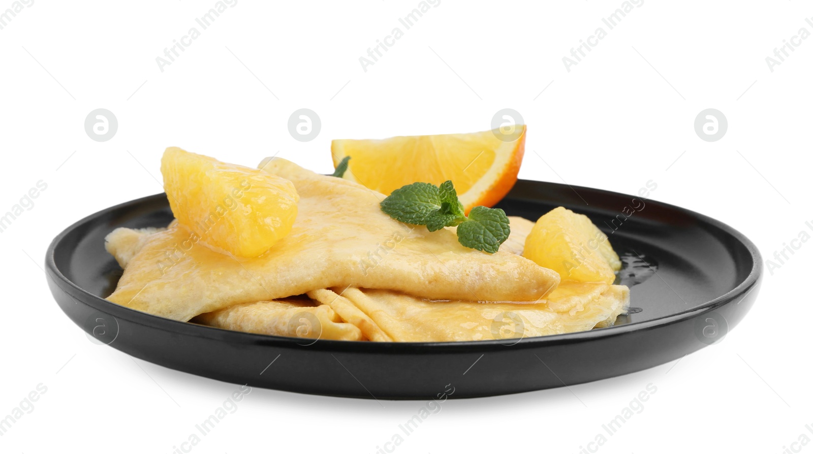 Photo of Delicious Crepes Suzette dessert isolated on white