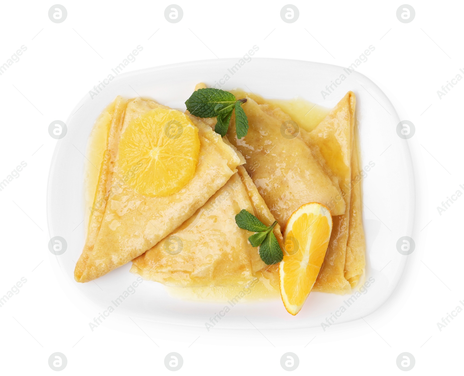 Photo of Delicious Crepes Suzette dessert isolated on white, top view