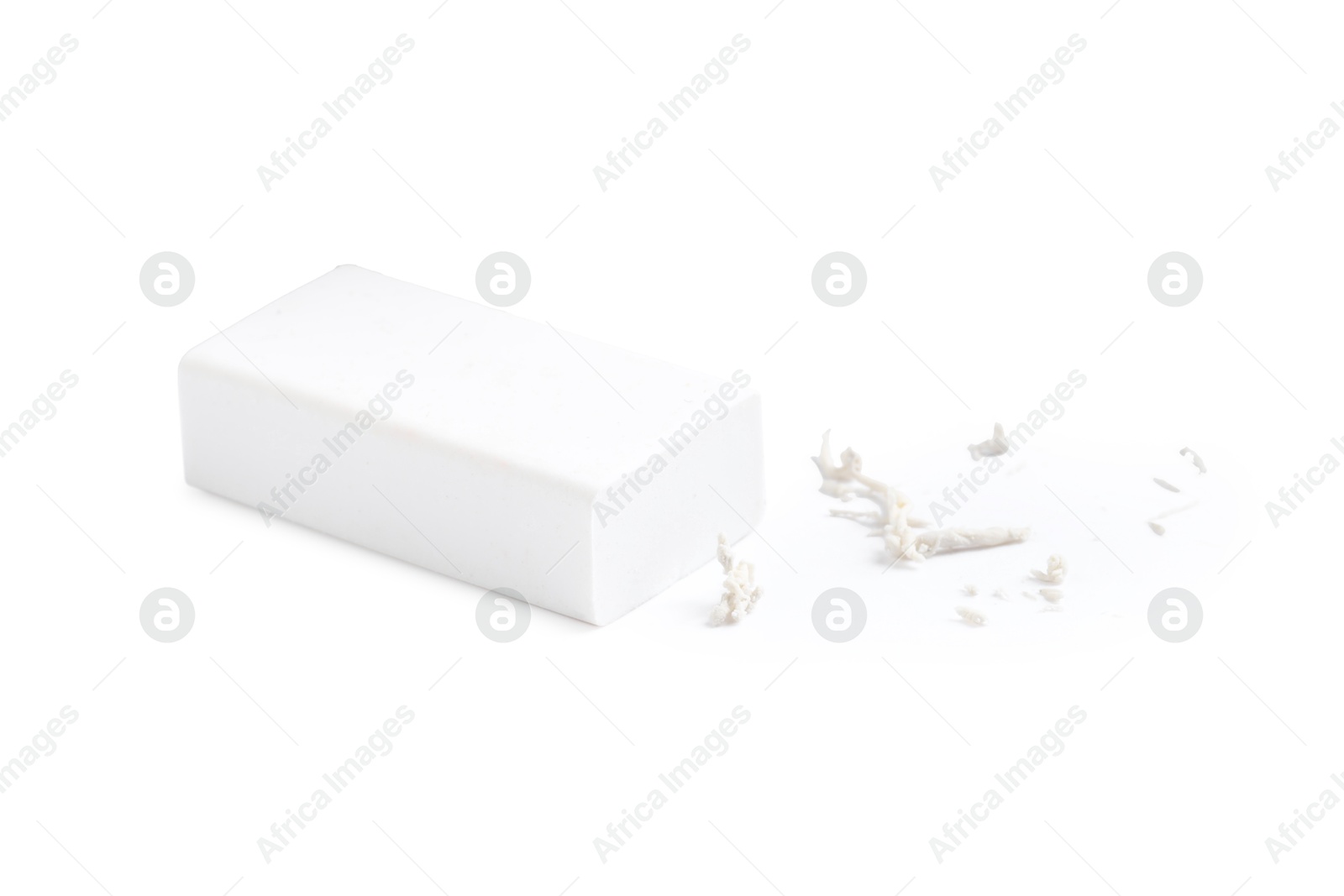 Photo of One eraser and scraps isolated on white