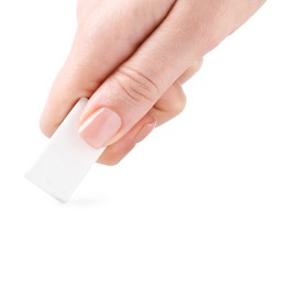 Photo of Woman using eraser on white background, closeup