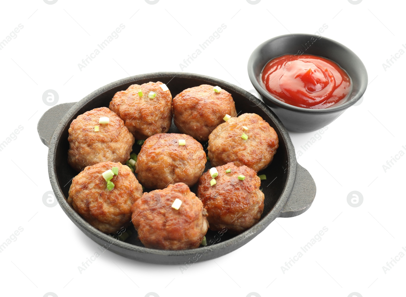 Photo of Tasty meatballs with green onion in baking dish and tomato sauce isolated on white