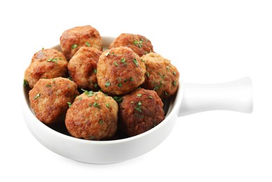 Photo of Tasty cooked meatballs with green onion in baking dish isolated on white