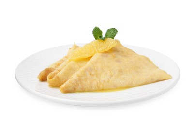 Photo of Plate with tasty crepes Suzette isolated on white