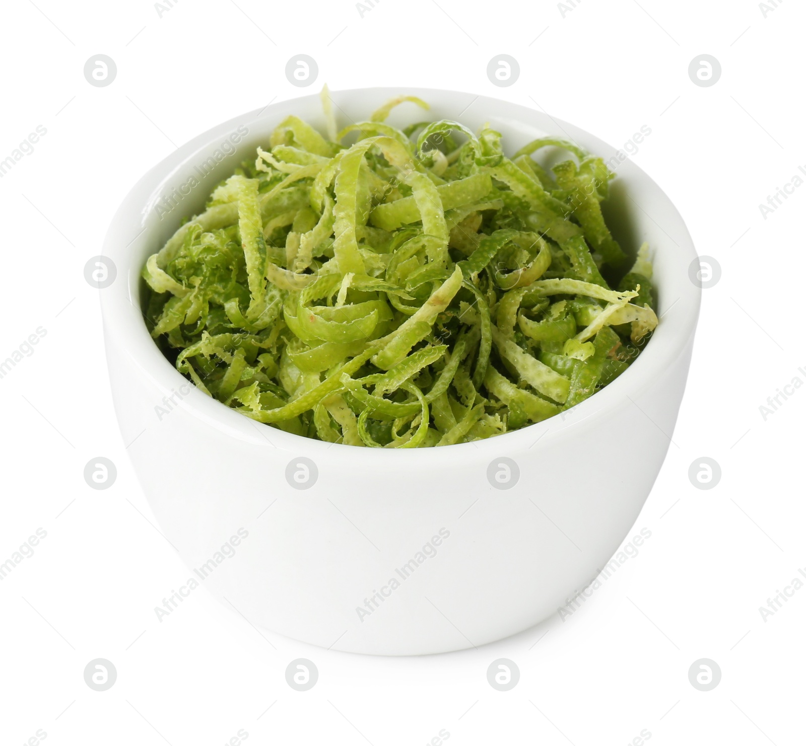 Photo of Fresh lime zest in bowl isolated on white