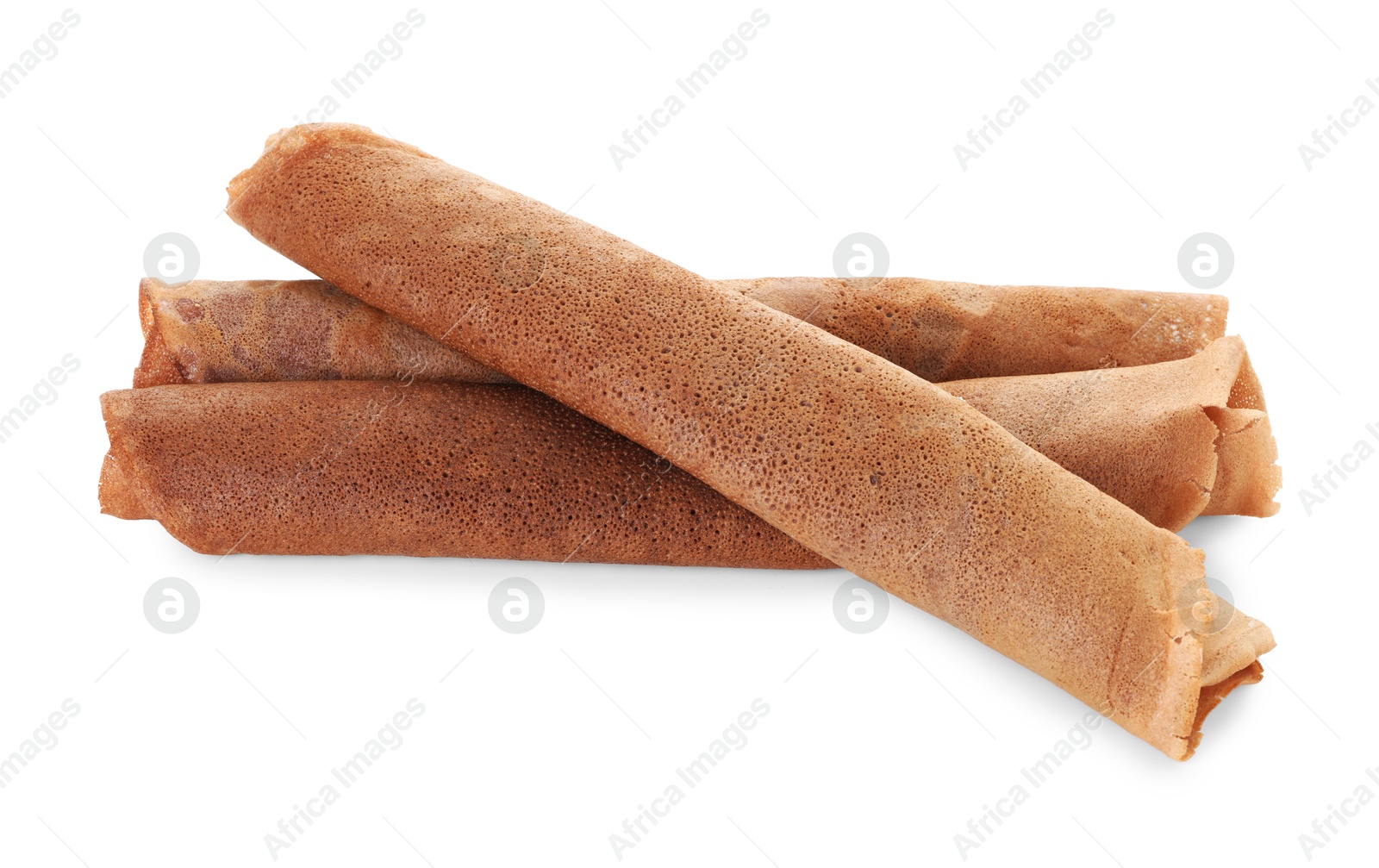 Photo of Rolled delicious chocolate crepes isolated on white