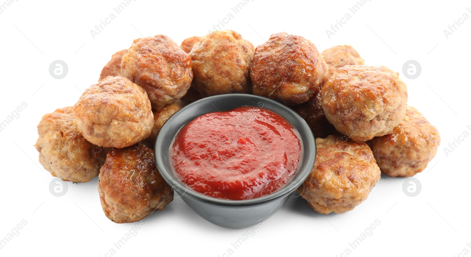 Photo of Pile of delicious meatballs and bowl with ketchup isolated on white