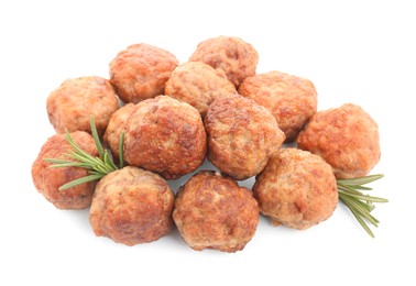 Photo of Pile of delicious meatballs and rosemary isolated on white