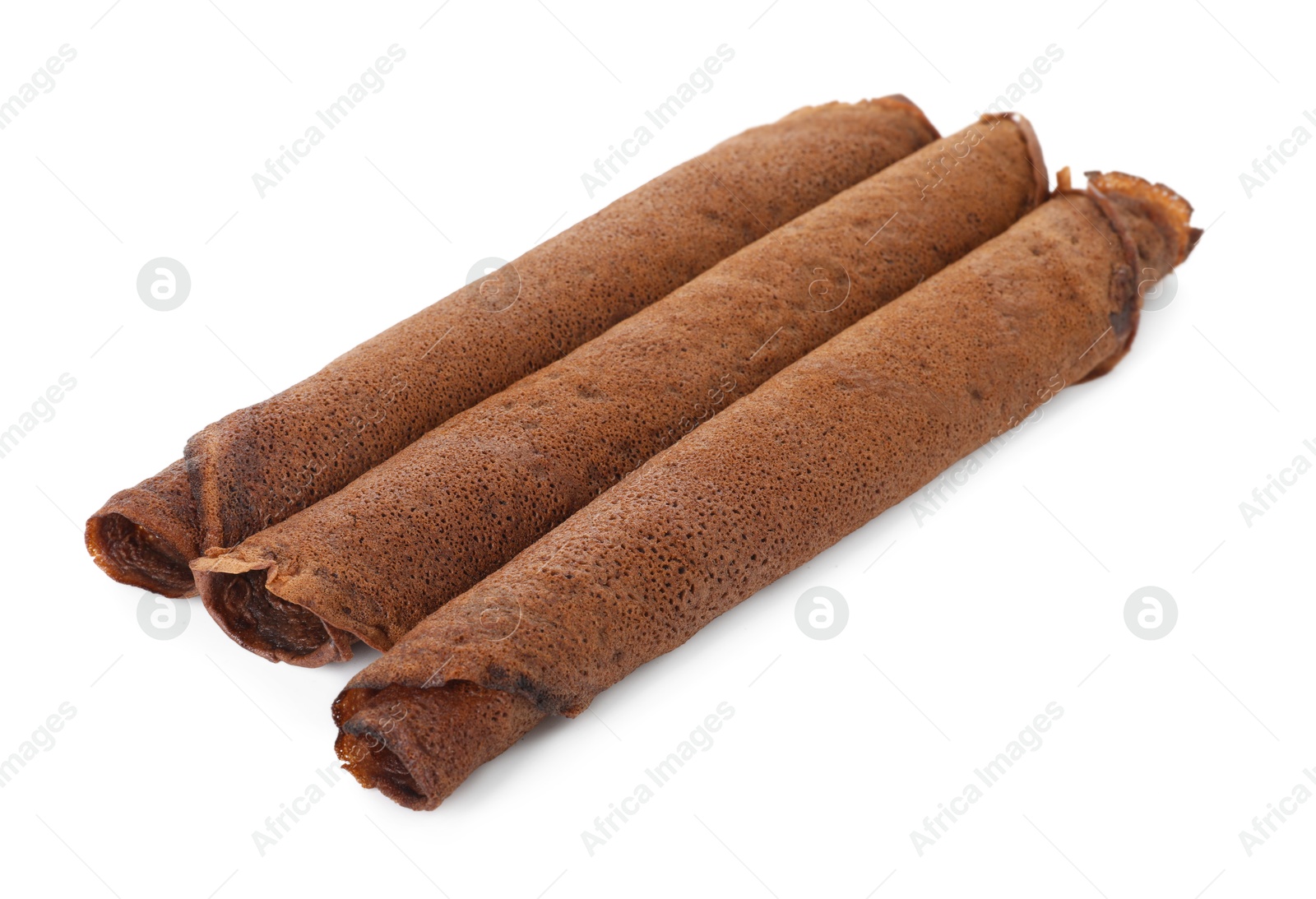 Photo of Rolled delicious chocolate crepes isolated on white