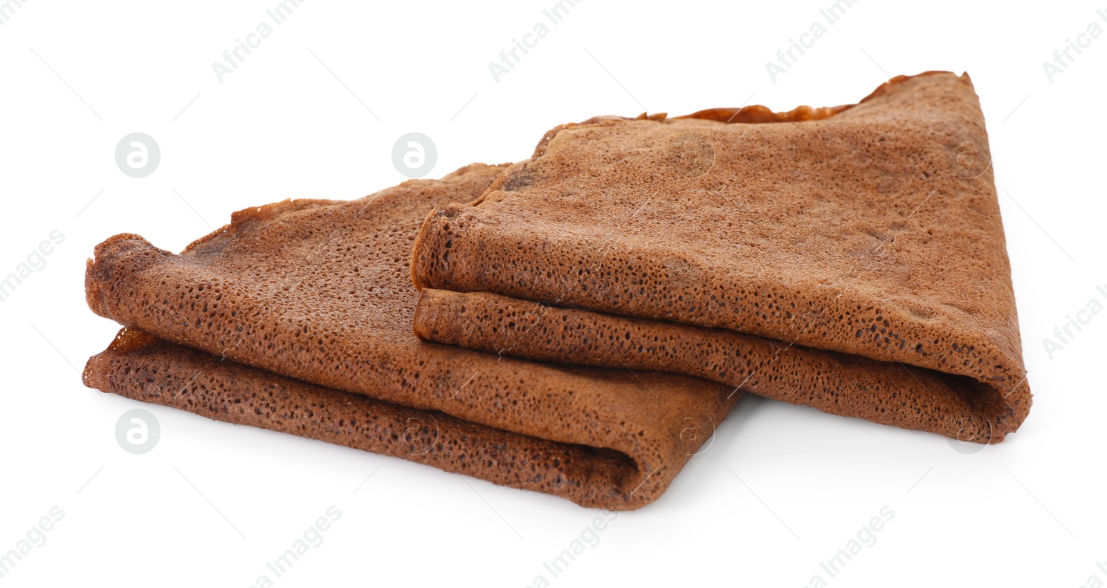 Photo of Folded delicious chocolate crepes isolated on white