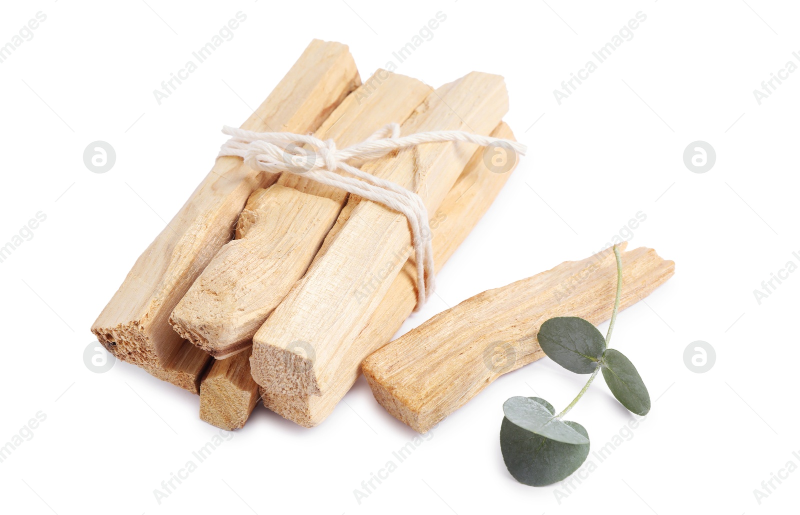 Photo of Palo santo sticks and eucalyptus branch isolated on white