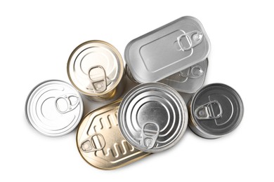 Photo of Many closed tin cans isolated on white, top view