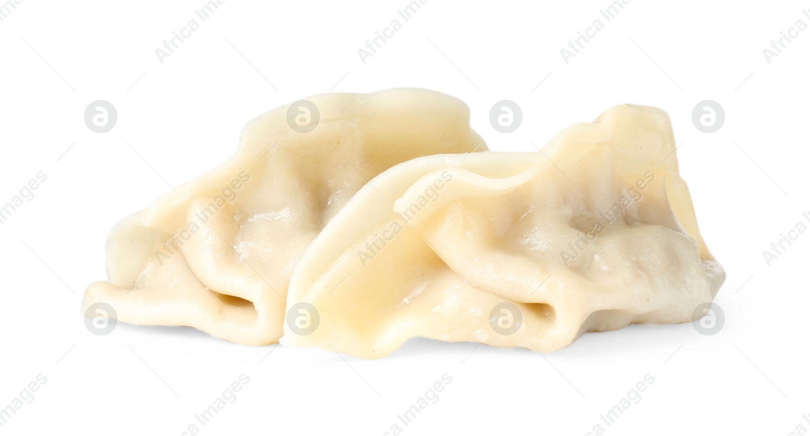 Photo of Tasty boiled gyoza (dumplings) isolated on white