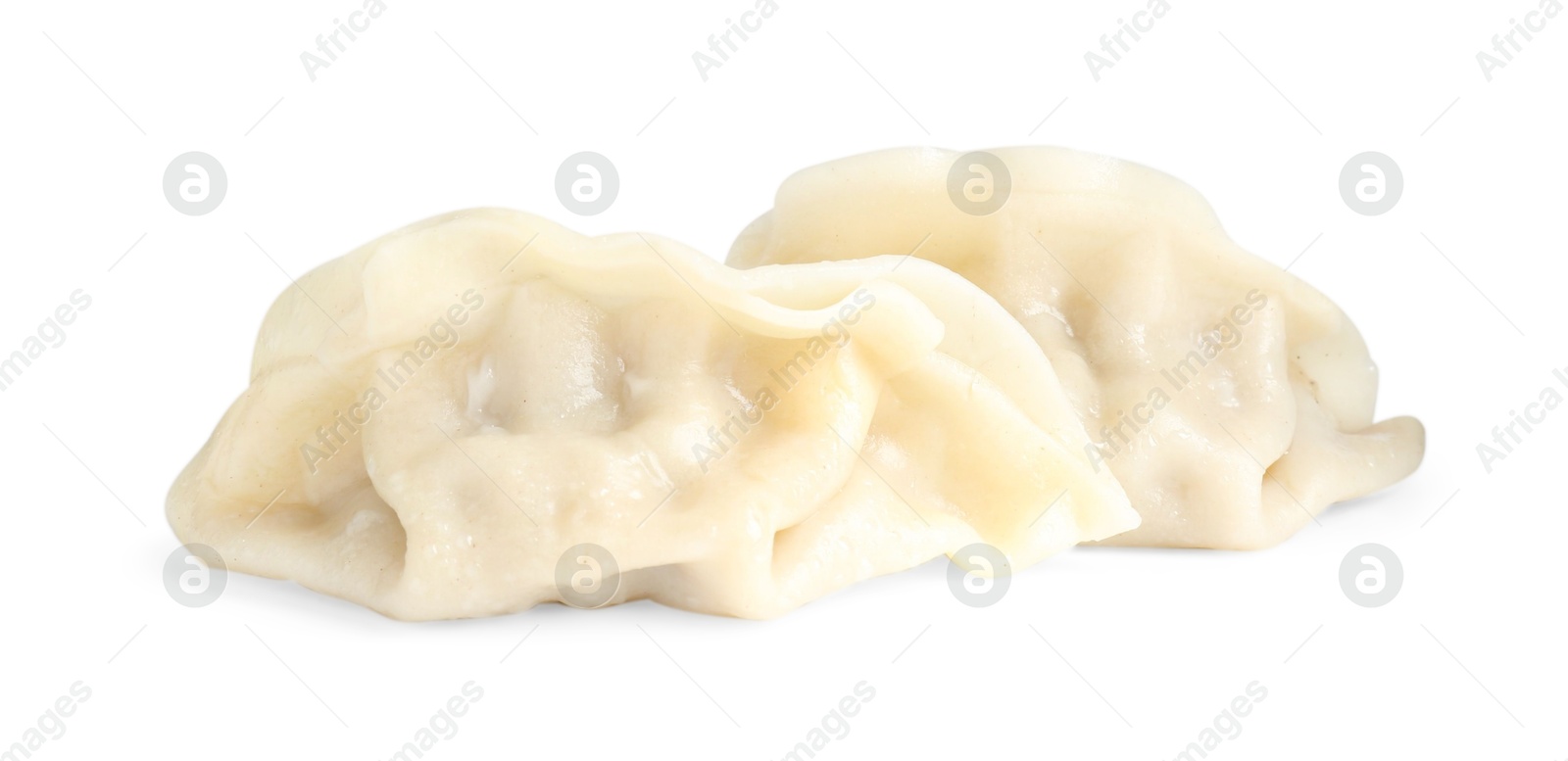 Photo of Tasty boiled gyoza (dumplings) isolated on white