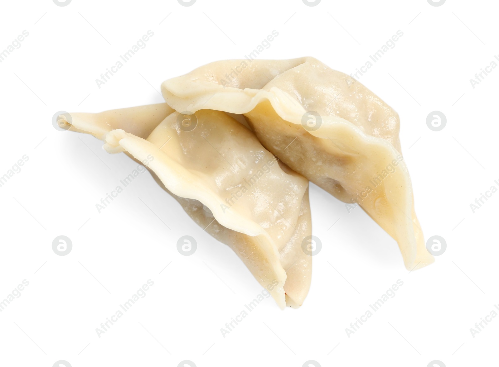 Photo of Tasty boiled gyoza (dumplings) isolated on white, top view