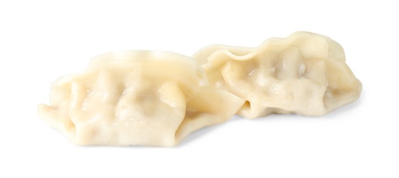 Photo of Tasty boiled gyoza (dumplings) isolated on white