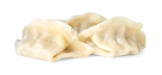 Photo of Tasty boiled gyoza (dumplings) isolated on white