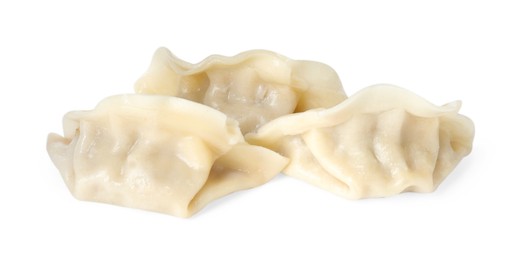 Photo of Tasty boiled gyoza (dumplings) isolated on white