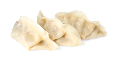 Photo of Tasty boiled gyoza (dumplings) isolated on white