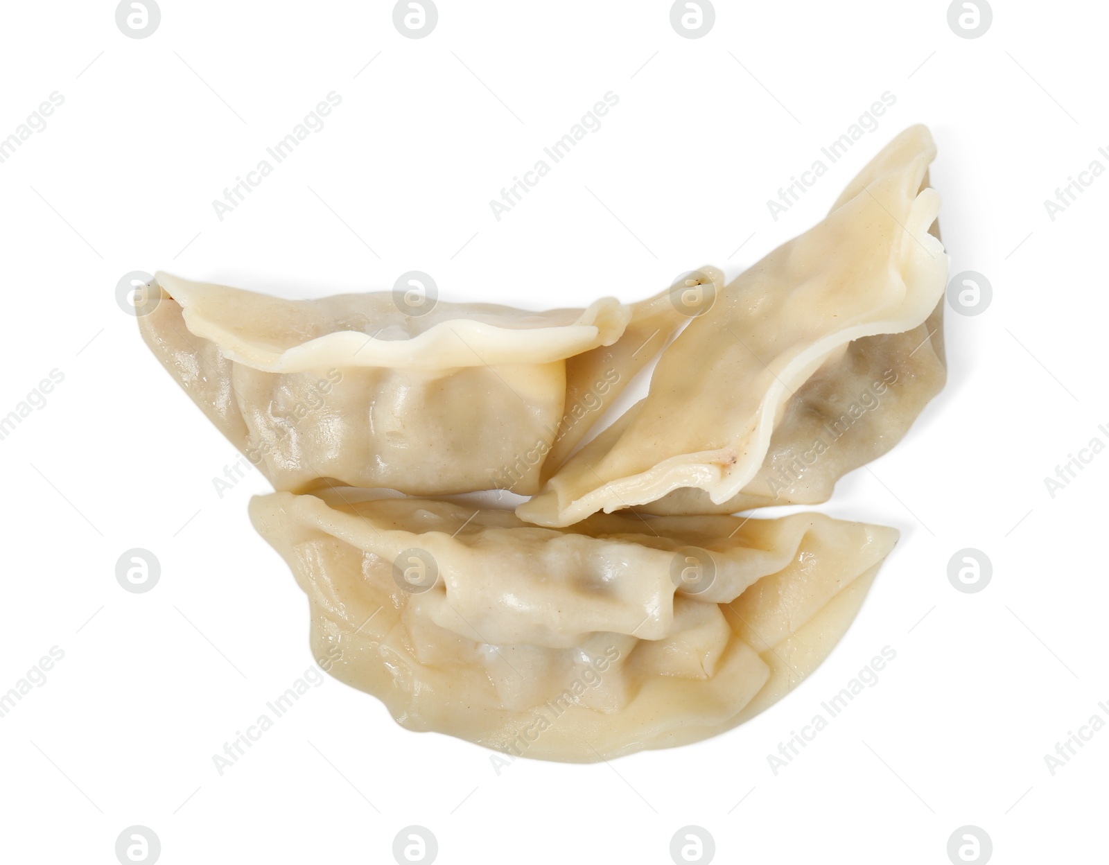 Photo of Tasty boiled gyoza (dumplings) isolated on white, top view