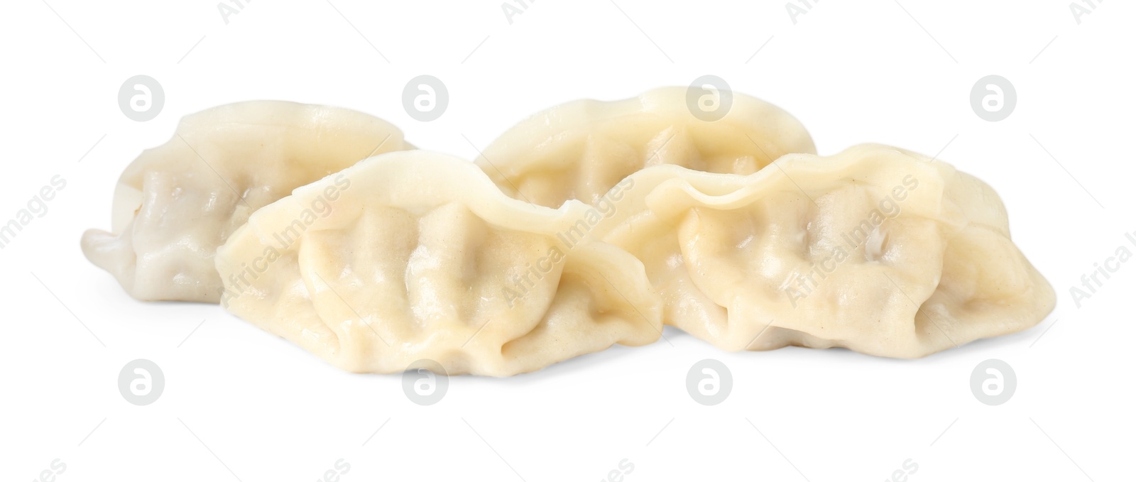 Photo of Tasty boiled gyoza (dumplings) isolated on white