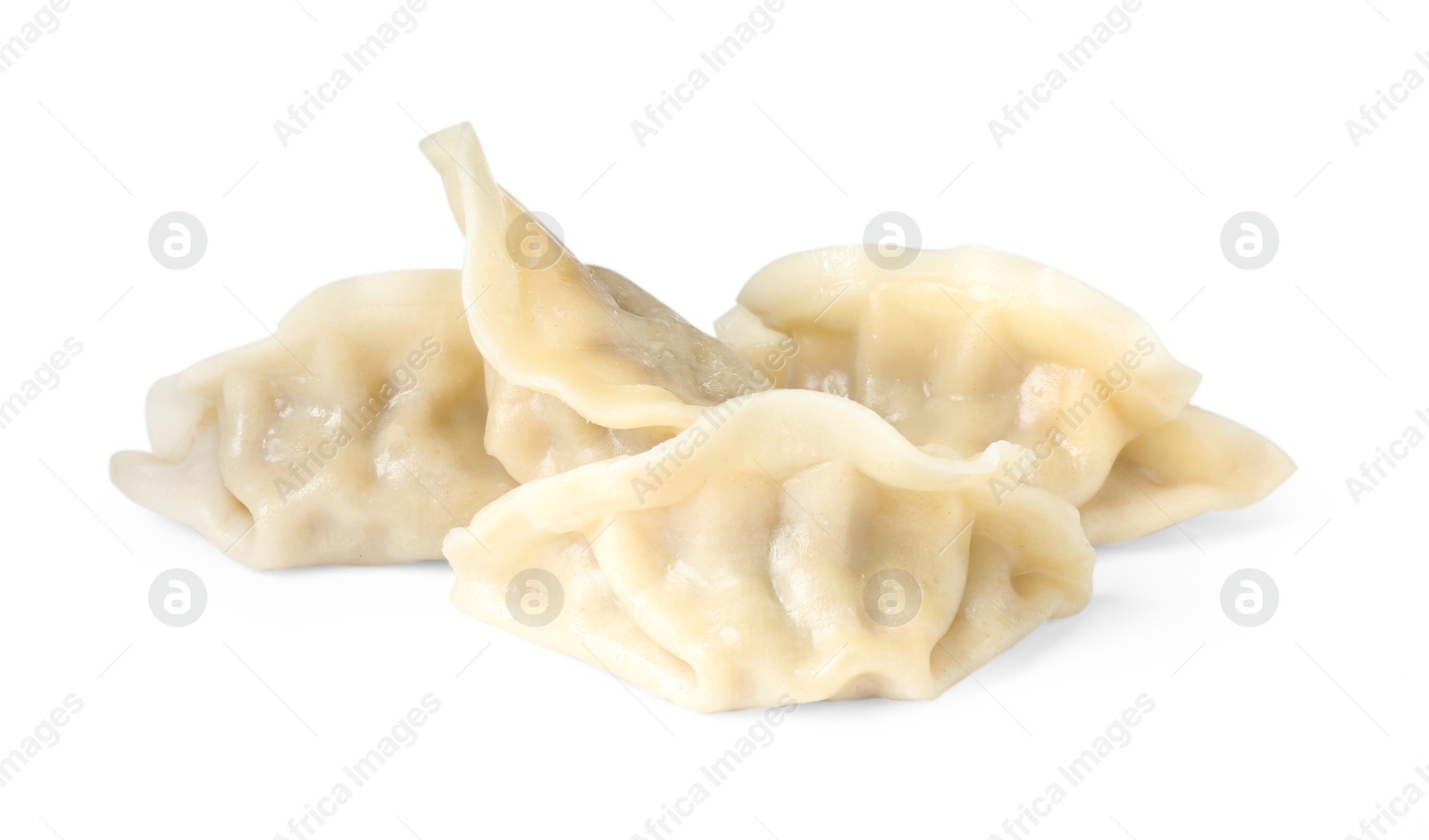 Photo of Tasty boiled gyoza (dumplings) isolated on white