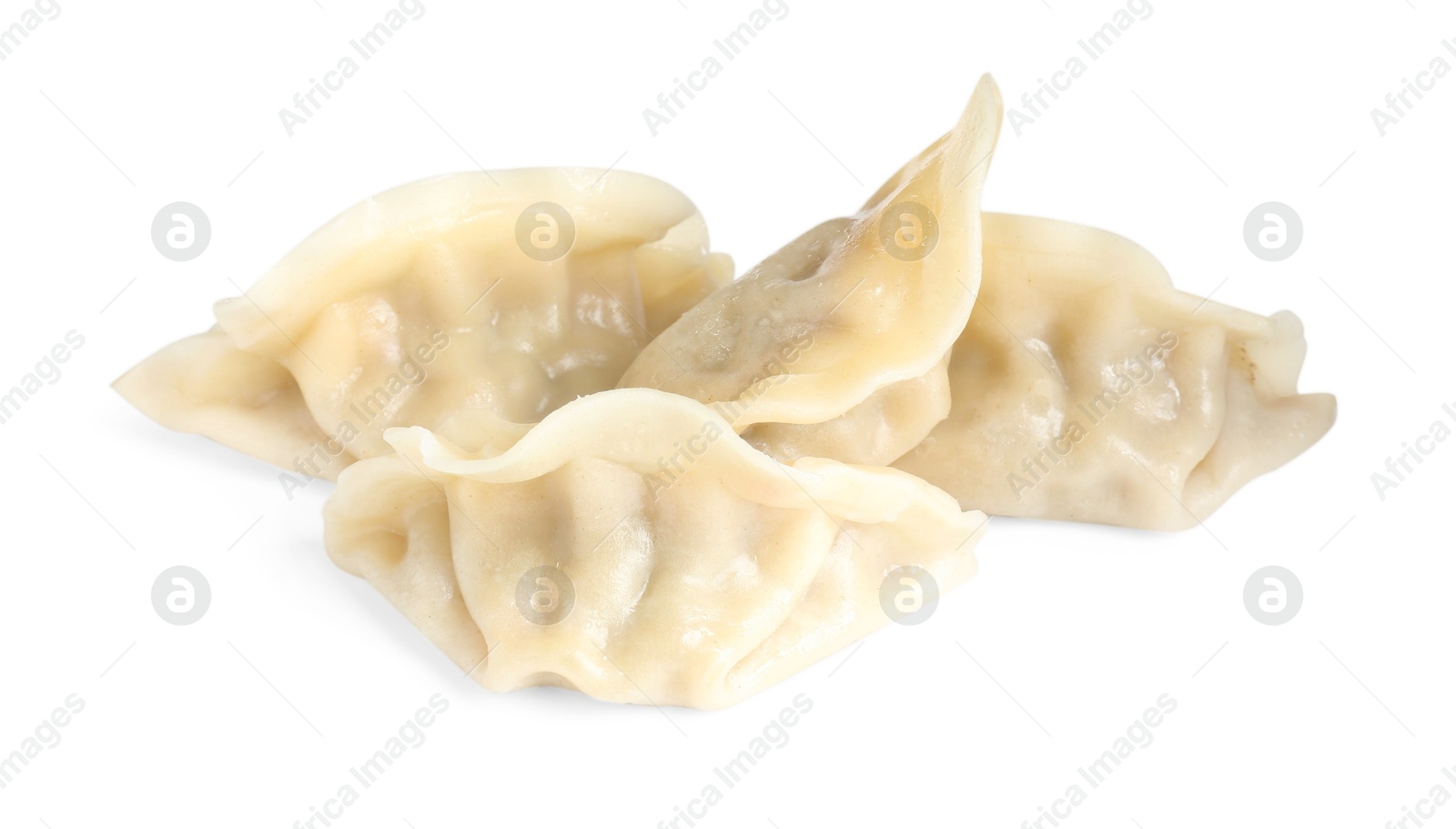 Photo of Tasty boiled gyoza (dumplings) isolated on white