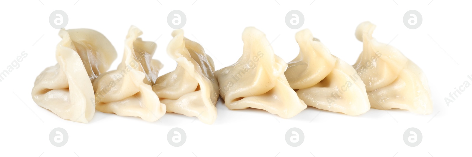 Photo of Tasty boiled gyoza (dumplings) isolated on white