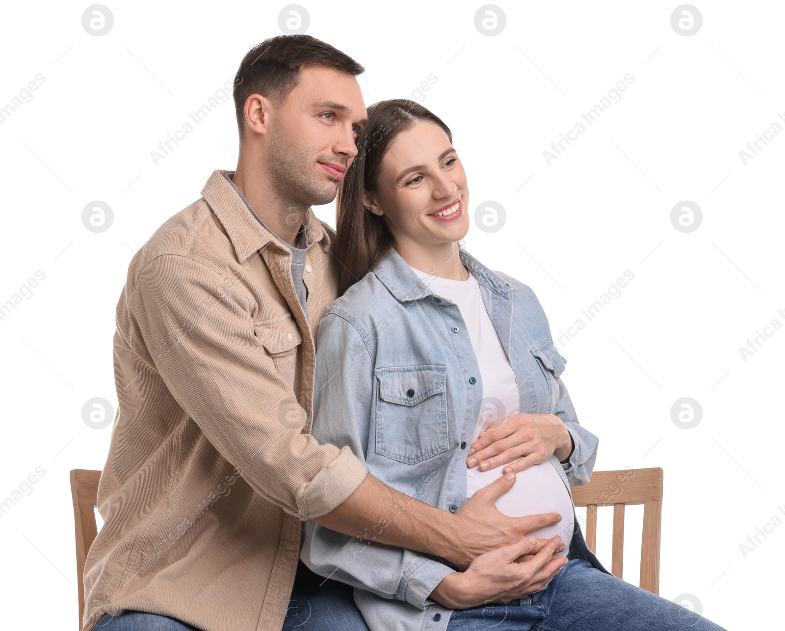 Photo of Pregnant woman and her husband on white background