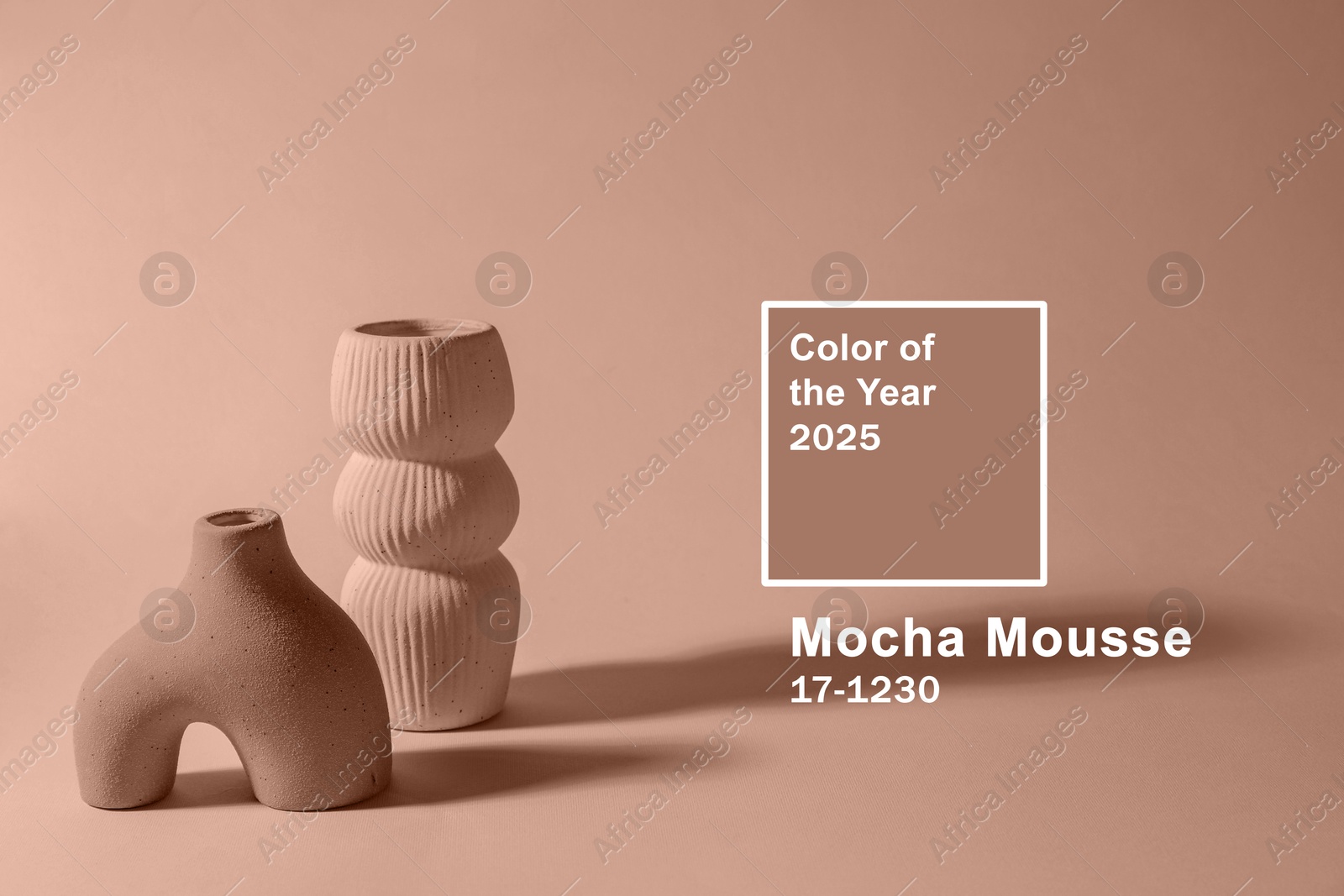 Image of Mocha mousse - color of 2025 year. Stylish vases and background in brown shade