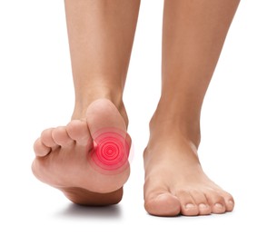 Image of Woman with joint inflammation on white background, closeup. Highlighted area on toe